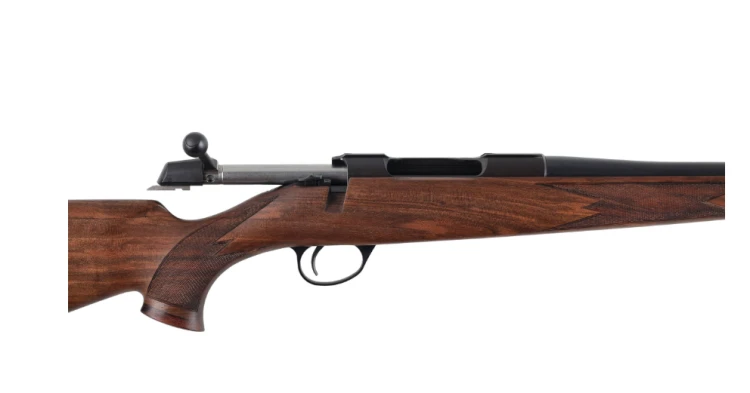 Zestaw SAKO-90: futerał, sztucer 8x57 JS i zapasowy magazynek.